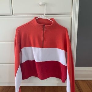 Orange white and red striped sweatshirt